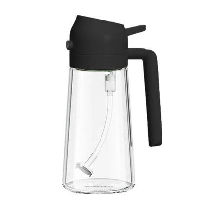 Clear glass carafe with black lid and handle on a white background