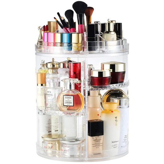 Clear makeup organizer with various cosmetic products on a white background