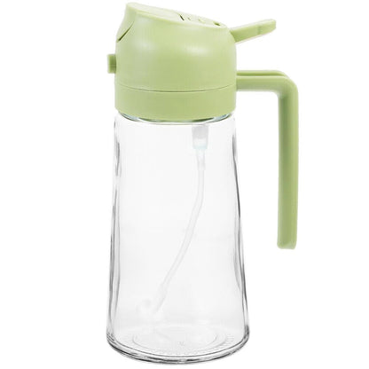 Clear glass bottle with a green lid and handle on a white background